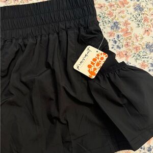 TAGS ON NEVER WORN free people movement get your flirt on short black